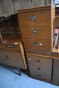 A selection of vintage Meredew Avalon teak style bedroom furniture comprising dressing table, two