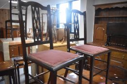 A pair of Edwardian mahogany bedroom chairs