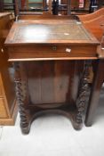A 19th Century rosewood and mahogany davenport having twist supports