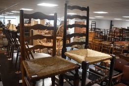 Two (not a pair) of 19th Century ladder back chairs having rush seats
