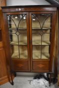 An Edwardian mahogany and inlaid display cabinet , on square tapered legs and spade feet, dimensions
