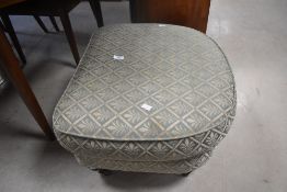 A modern upholstered footstool, labelled to underside, Lincoln House Home Furnishings, width approx.