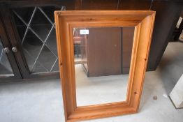 A modern pine mirror, approx. 57 x 43cm
