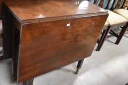A 19th Century mahogany sutherland style table having square gate legs, width approx. 79cm