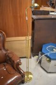 A modern brass effect angle poise reading lamp 43cm overall.