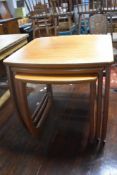 A vintage Parker Knoll nest of three tables, width 52cm, numbered with label 5634