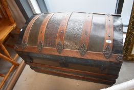 A vintage dome top travel trunk having croc skin style decoration, width approx. 85cm