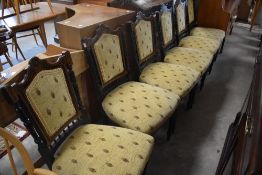 A set of six Victorian ebonised dining chairs having turned framed with bobbin turned supports to