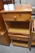 A pair of pine bedside cabinets, each with single drawer and open section below 51cm x 47cm x 44cm