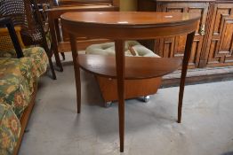 A reproduction mahogany demi-lune side table, of traditional design 72cm x 76cm x 38cm sold together