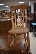 A traditional rocking chair having rail back and turned frame, nice proportions, width approx. 45cm