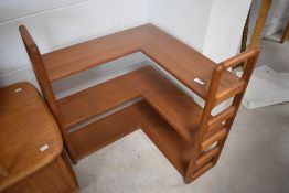 A useful late 20th century Ercol/G-plan style corner wall shelving unit , with three tiers, and