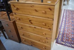 A modern yellow pine chest of five drawers, dimensions approx. W81 H108 D44cm