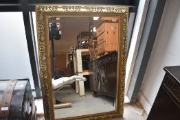 A modern gilt frame wall mirror , approx. 110 x 78cm