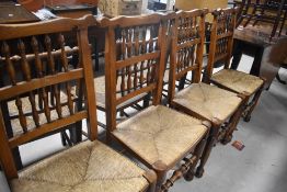 A set of four nice reproduction rush seated spindle back kitchen chairs