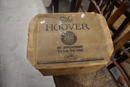 A vintage wooden cheese press, diameter approx. 28cm, in vintage cardboard Hoover box