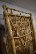 A vintage bamboo bed frame with bespoke mattress, width of mattress, 112cm
