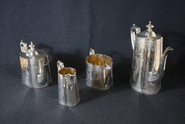 A Victorian silver four piece tea set, comprising a coffee pot, teapot, sugar and cream, all of oval