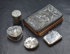 A Victorian silver heart shaped trinket box, having crimped rims and embossed scroll work with a