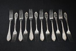 A set of twelve 19th century German white metal 800. grade forks, having thread decoration and