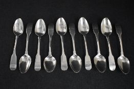 A set of ten George III Irish silver fiddle pattern teaspoons, having a heraldic crest to