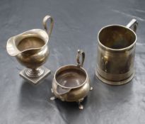 A George III silver tankard, of traditional form having a moulded rim and line work to the body,