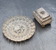 A white metal filigree trinket box, of rectangular form with decorative scroll work, along with a
