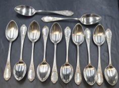 A set of twelve 19th century German white metal 800. grade teaspoons, having thread decoration and