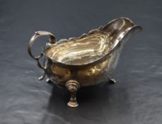 A Victorian silver sauce boat, of traditional form having a Chippendale style rim, narrow spout