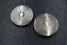 A George V silver makeup compact, having engine turned decoration and central circular cartouche