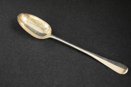 An Edwardian silver Hanoverian rat-tail pattern basting spoon, having 'DJJ' monogram to terminal