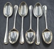 A set of six Edwardian silver Hanoverian rat-tail pattern serving spoons, having 'DJJ' monogram to