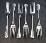 A set of six Edwardian silver Hanoverian pattern fish forks, having 'DJJ' monogram to terminal