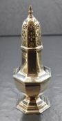 A 20th century silver sugar caster, the pointed finial over the pierced top, on a bulbous