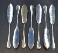 A group of seven Edwardian silver Hanoverian pattern fish knives, having 'DJJ' monogram to