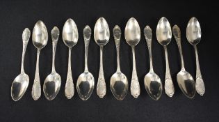 A set of twelve 19th century German white metal 800. grade serving spoons, having thread