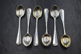 A set of six Edwardian silver Hanoverian rat-tail pattern sorbet spoons, having 'DJJ' monogram to