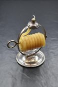An Edwardian silver wax jack, of circular form having a step moulded top over the circular moulded