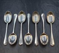 A group of seven Edwardian silver Hanoverian rat-tail pattern teaspoons, having 'DJJ' monogram to