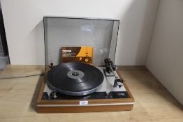 A Thorens classic TD160 Turntable with dust cover