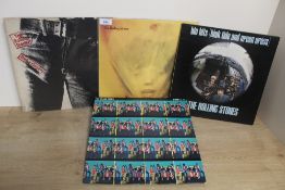 A Rolling Stones Lot - four in total with the iconic Warhol designed ' zip ' sleeve
