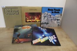 A five album rock lot with AC/DC , Deep Purple and more on offer here VG/VG+ in general