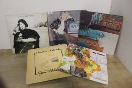 A Lot of Joni Mitchell - eight albums in total , brilliant music and recommended