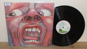A King Crimson ' in the court of ' gatefold VG/VG+ Island palm tree label vinyl album