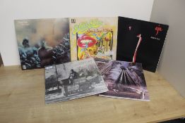 A lot of five albums by Steely Dan - condition is at least VG with some better - we recommend