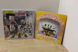 A Beatles lot of two- please note the sleeve damage on Anthology 3 , vinyl is still VG+
