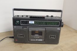 A Sharp vintage Radio Cassette player