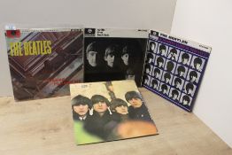 A Beatles Lot - six records in total - a mix of early and later pressings - VG/VG or better , as