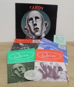 A selection of Queen items - programme and a nice badge which does have some fade - also included
