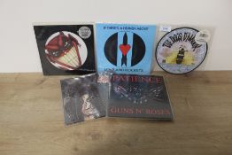 A lot of rock 45's as in photos - metal interest